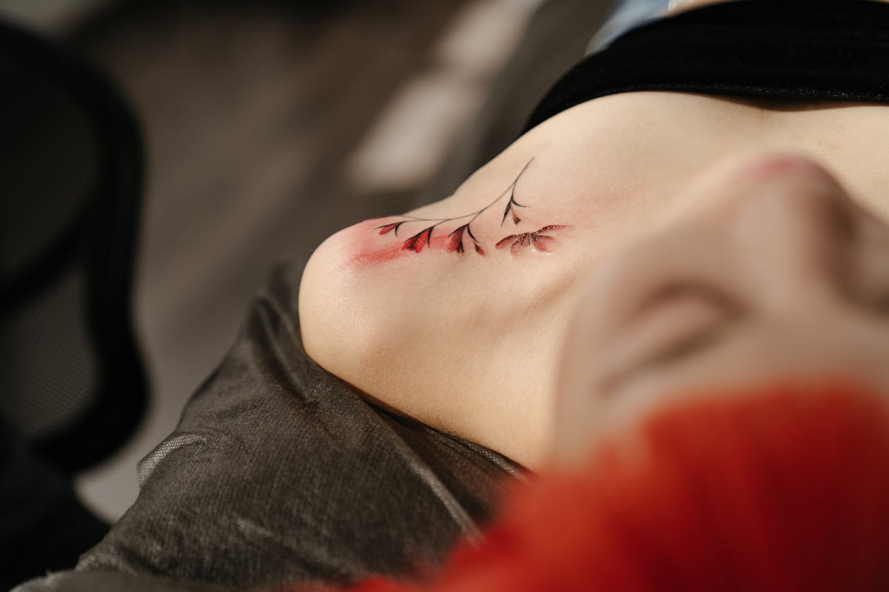 About Artful shoulder tattoo in a tattoo studio setting. Captures detail and creativity.